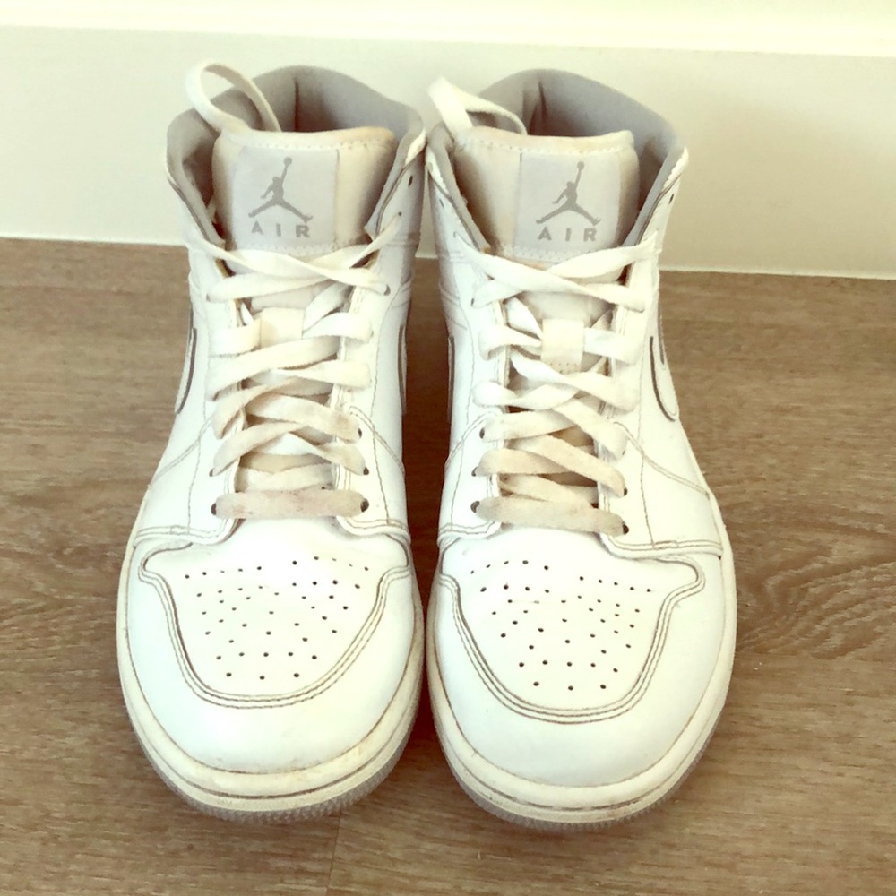 All white Nike Air Jordan’s